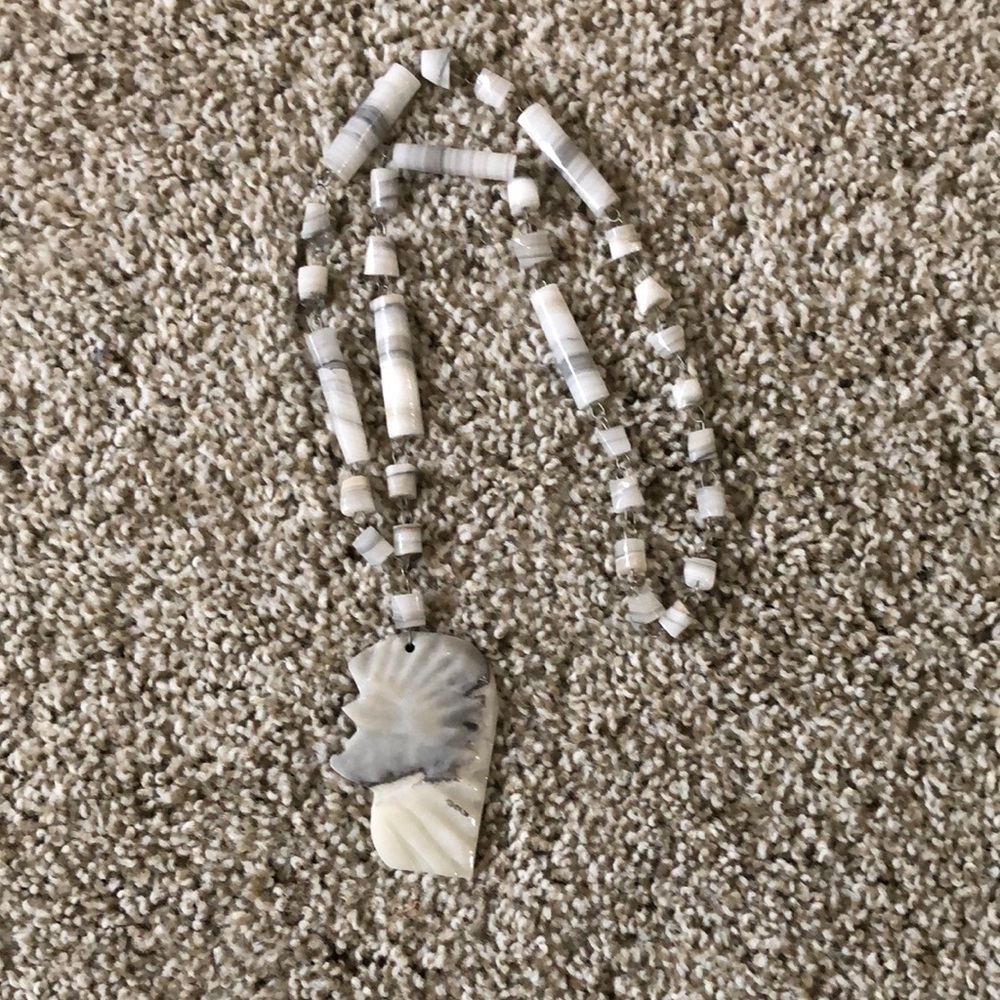 Vintage Carved Stone necklace. One stone is broken. See photo.  Heavy. Mexican